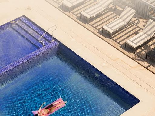 Luxury swimming pool at sunrise